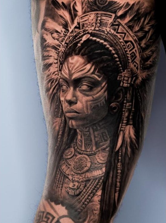 Aztec woman in a feathered headdress, forearm