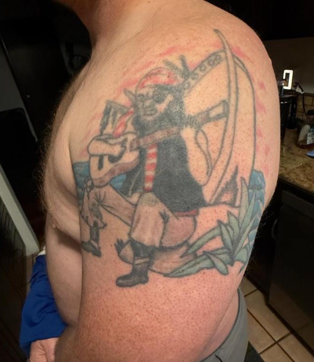 Old faded tattoo before the cover-up